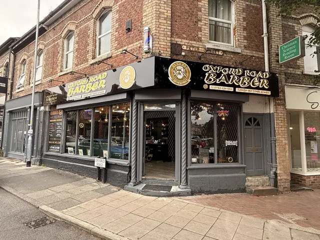 The Oxford Road Barber shopfront on the corner